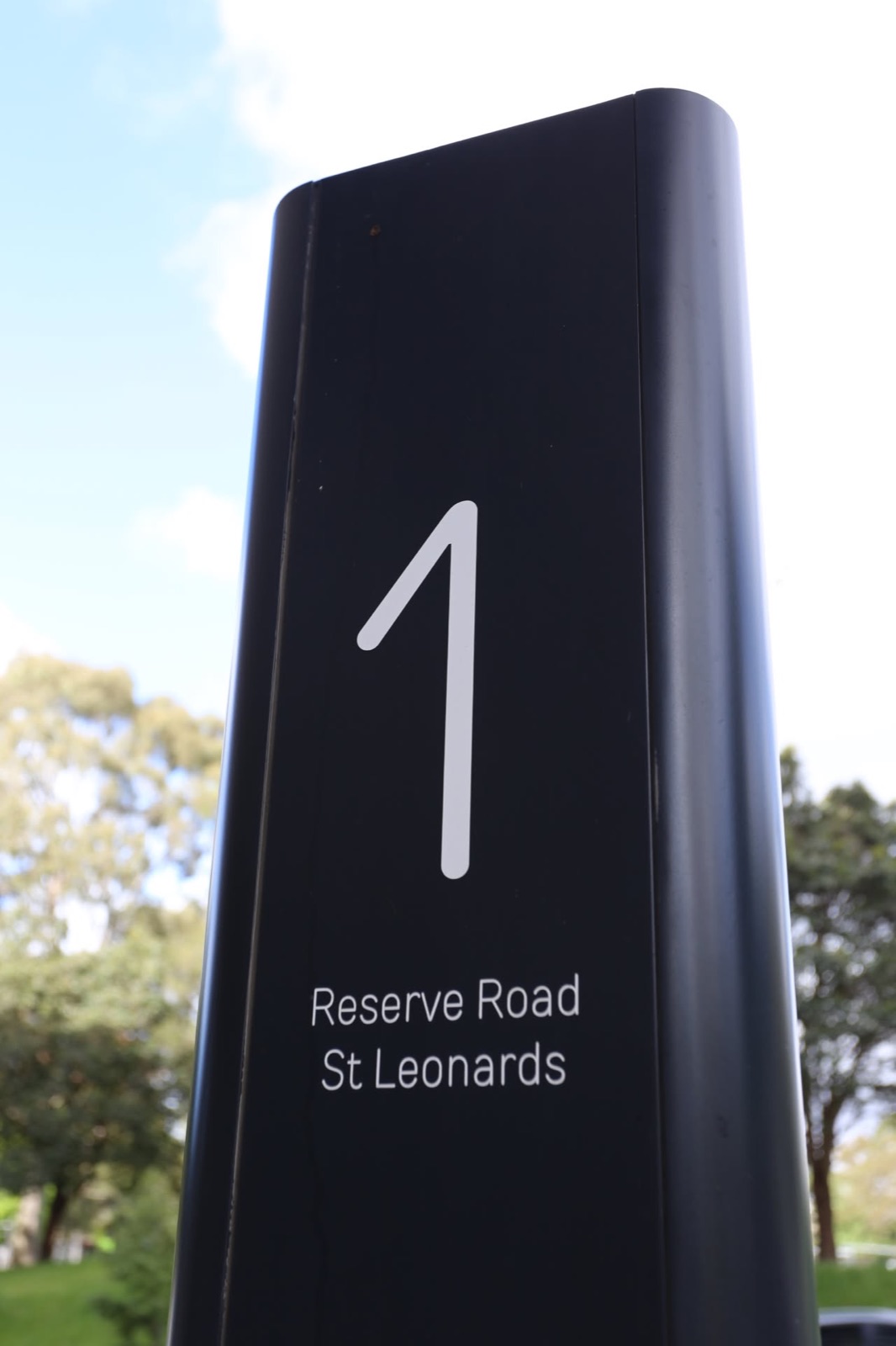 The 1 Reserve Road sign outside our building in St Leonards